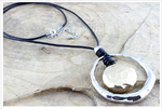 Two tone circle necklace on Leather cord, Necklace - simple to stunning
