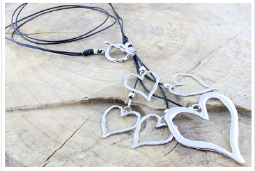 Unique Cascade of polished Handmade hearts on 2 strands of leather cord, Necklace - simple to stunning
